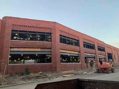 BUILDING 400 - LOOKING WEST, WINDOW FRAME INSTALLATION PROGRESS ON B STREET