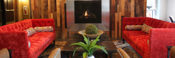 warehouse hotel lobby with red couches