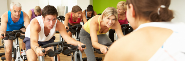 group of people in biking class