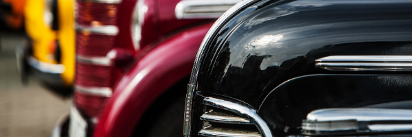 old cars in a line