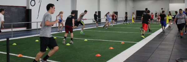 group running up and down turf