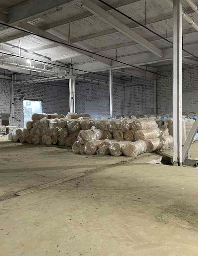 Building 300 - Roof and Wall Insulation Being Stored in Bldg 100