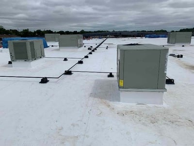 GAS PIPING INSTALLATION ON ROOF NEARING COMPLETION