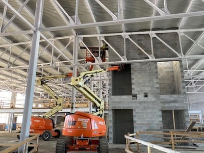 INSTALLATION OF STEEL BEAMS IN ELEVATOR