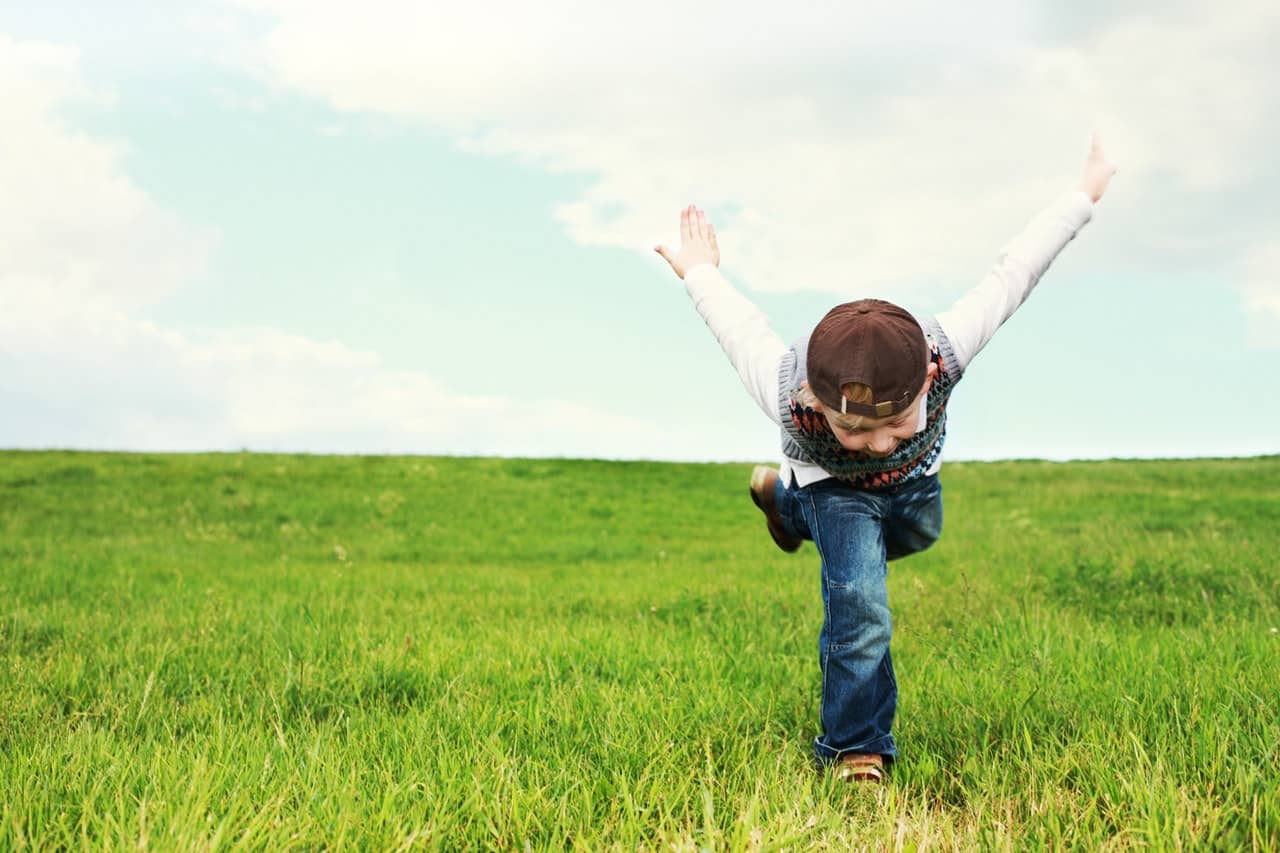 boy-playing-field