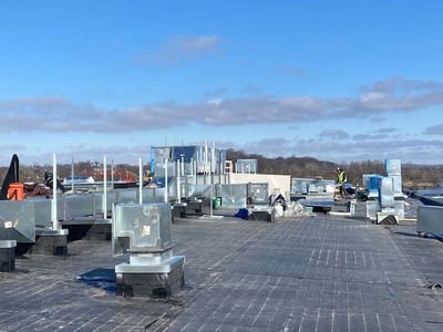 LOOKING NORTH – INSTALLATION OF NEW HVAC UNITS OF THE ROOF OF SECTOR 2