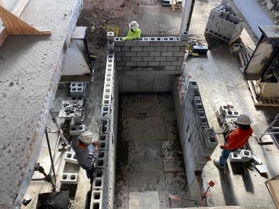 LOOKING SOUTHEAST – INSTALLATION OF ELEVATOR 2 3 SECTOR 1