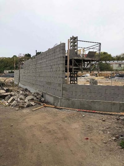 LOOKING WEST – MASONRY PROGRESS