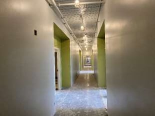 Looking north painting entry walls into hotel rooms 2nd floor sector 4