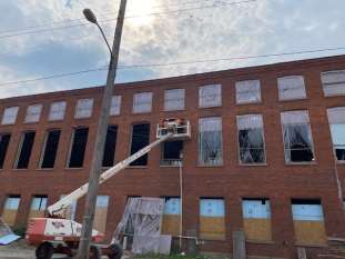 PREPPING WINDOW OPENINGS OF HOTEL ROOMS