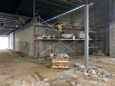 masonry installation of north wall of locker room