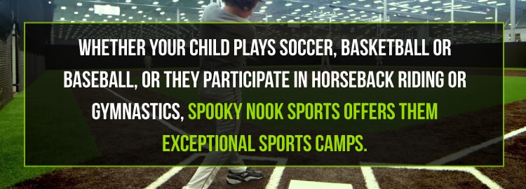 baseball player standing on Spooky Nook Sports indoor diamond