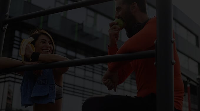 athletes eating fruit before a workout