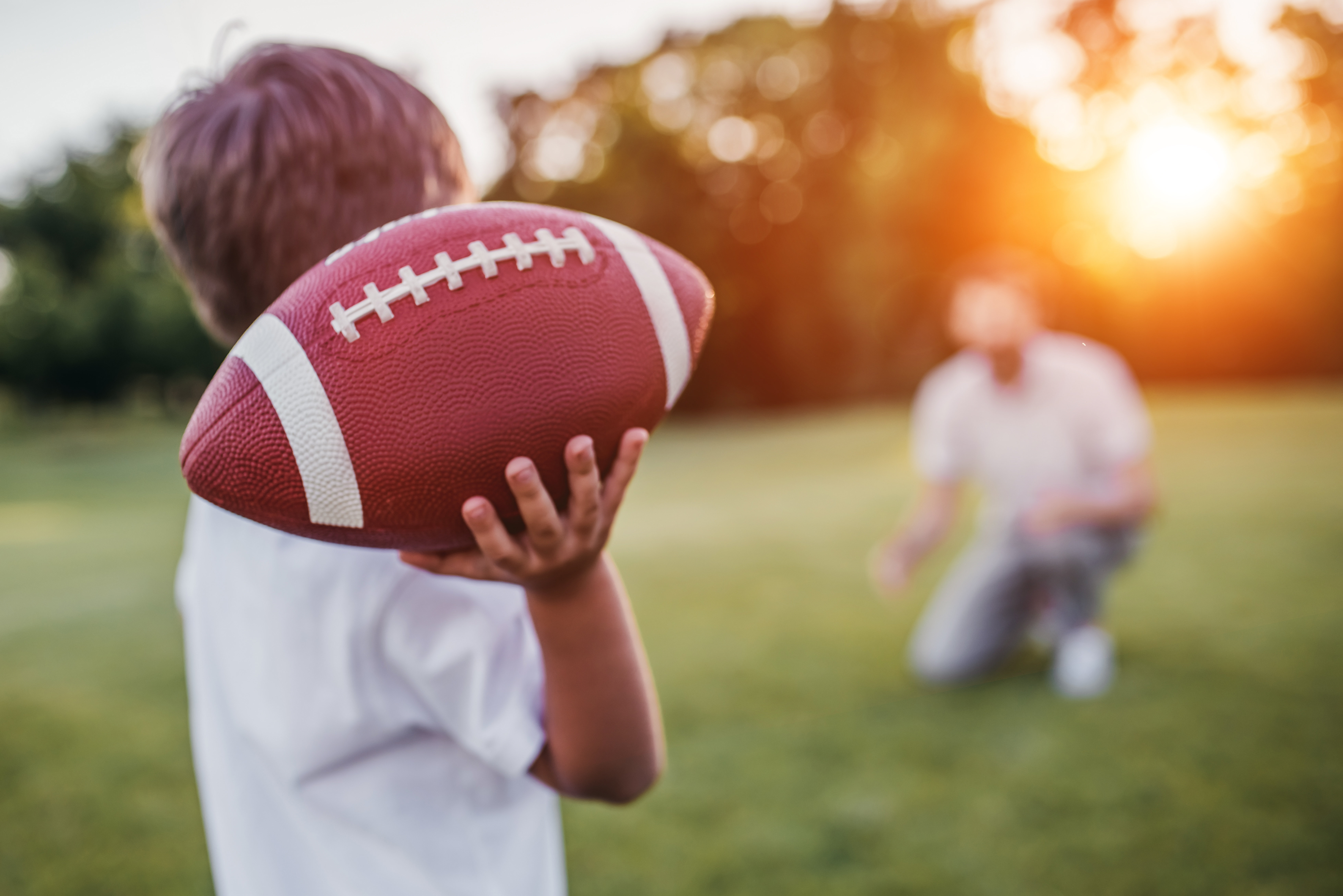 Boy Throwing Football