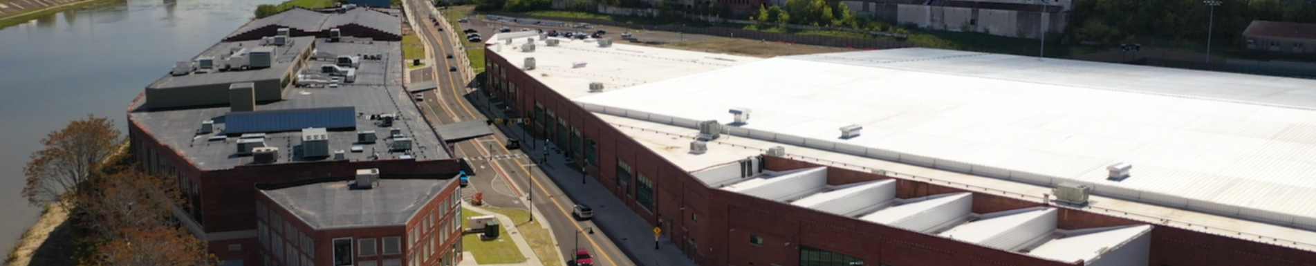 https://2956241.fs1.hubspotusercontent-na1.net/hubfs/2956241/Drone%20-%20CM%20-%20Facility.png background-image