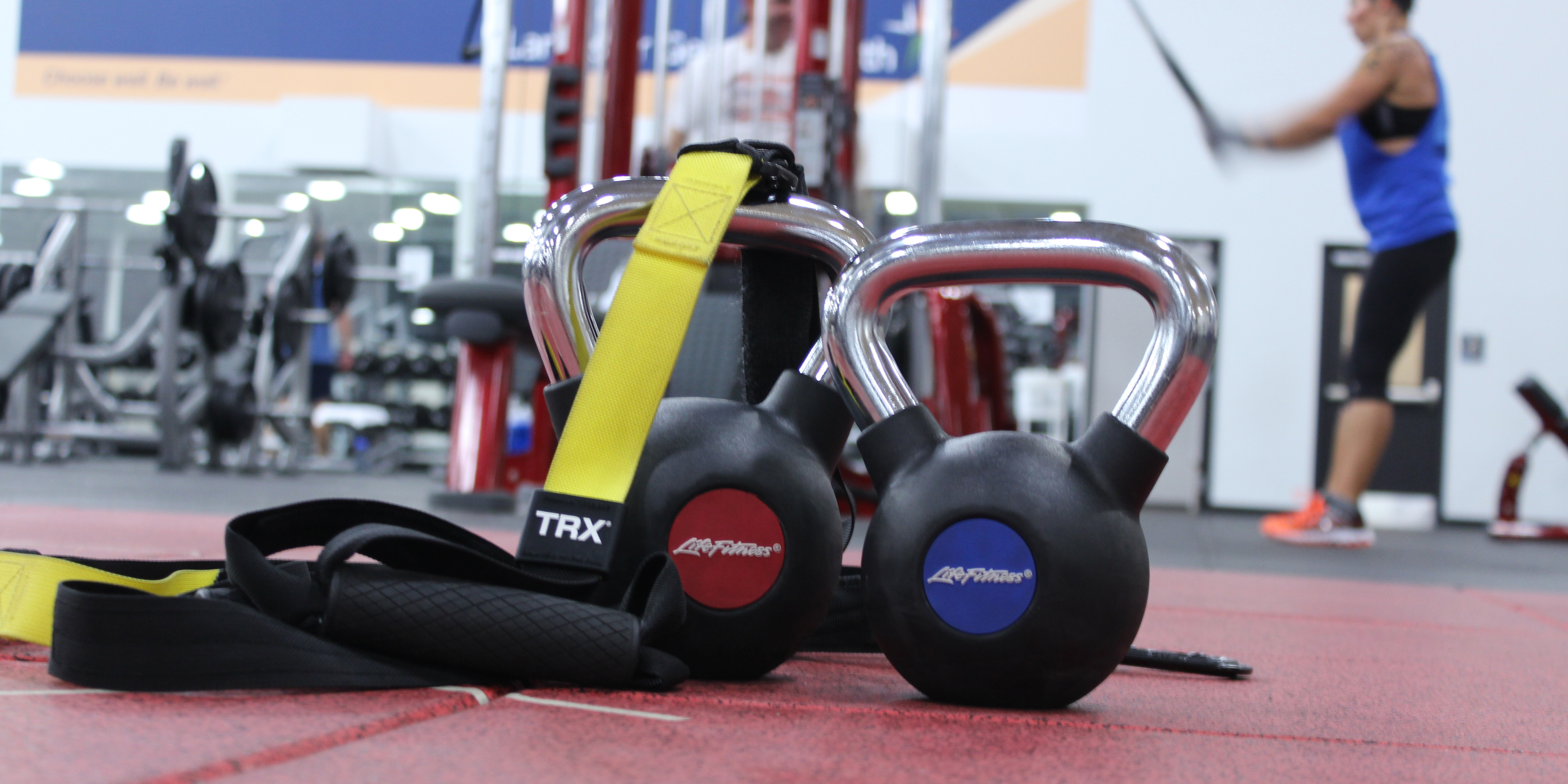 two LifeFitness kettle bells