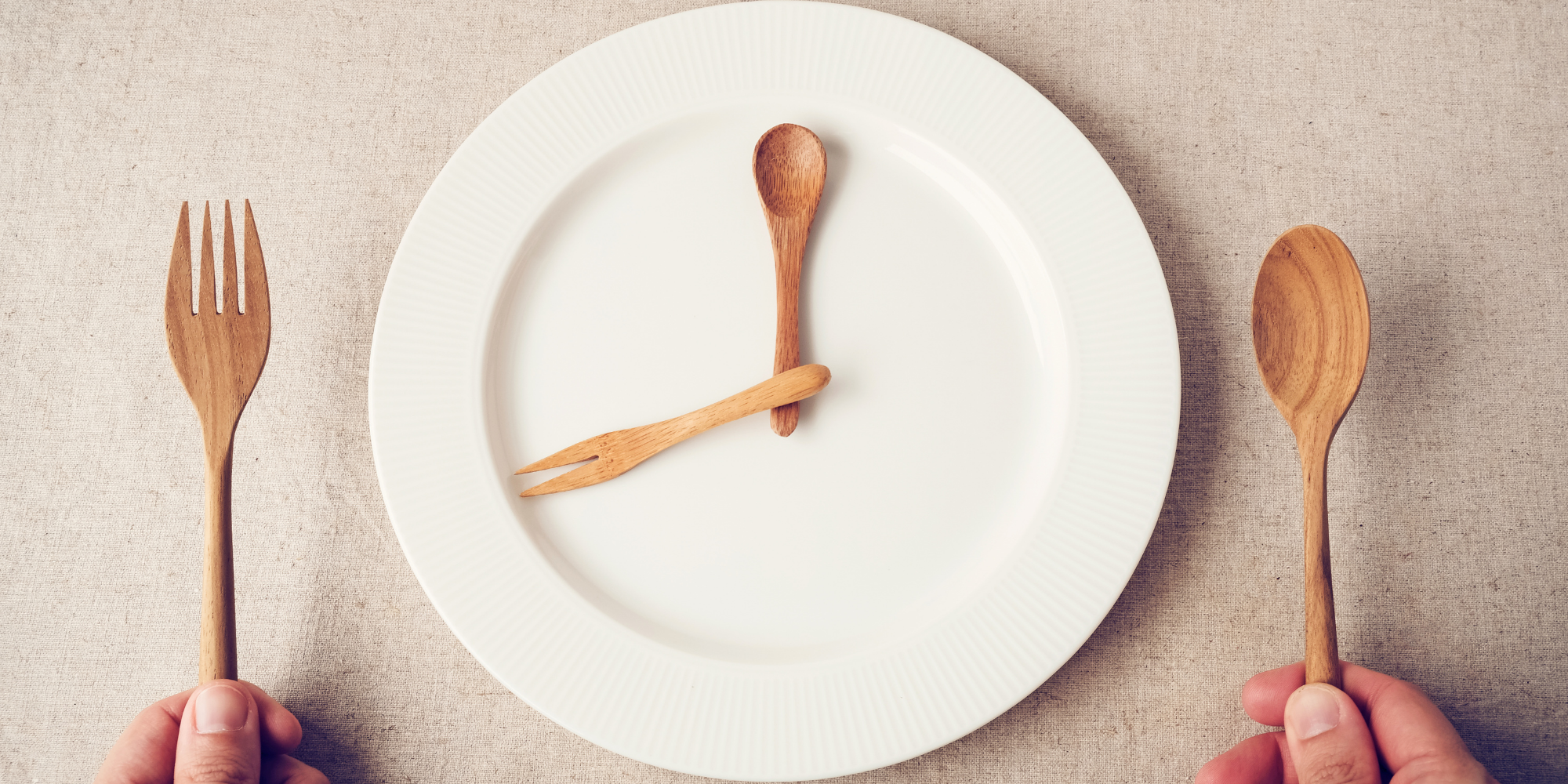 white plate with wooden spoons