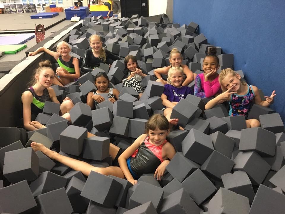 Youth Gymnastics Group in Foam Pit