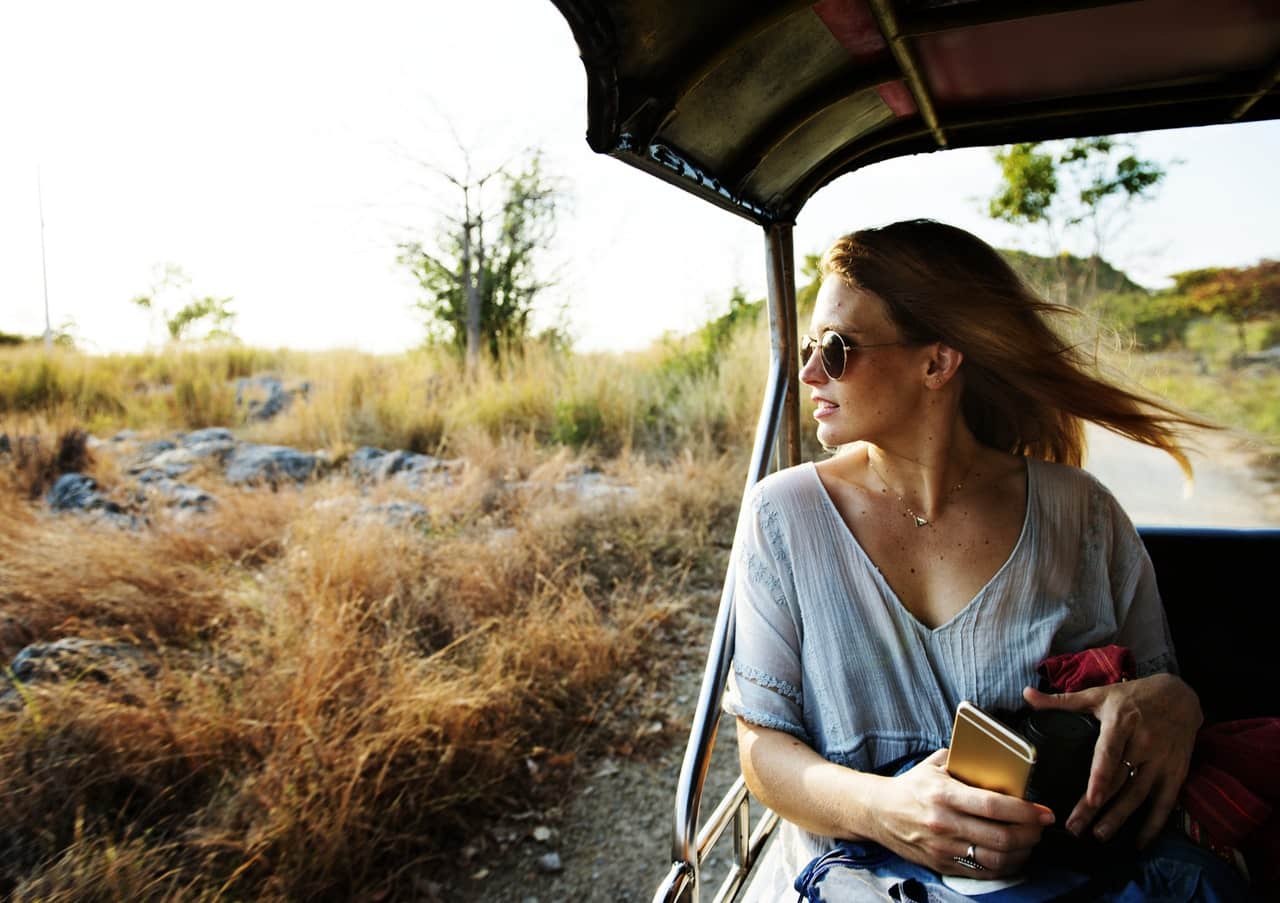 woman-traveling-roadside